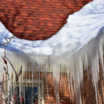ice buildup on roof and in gutters - ice dam